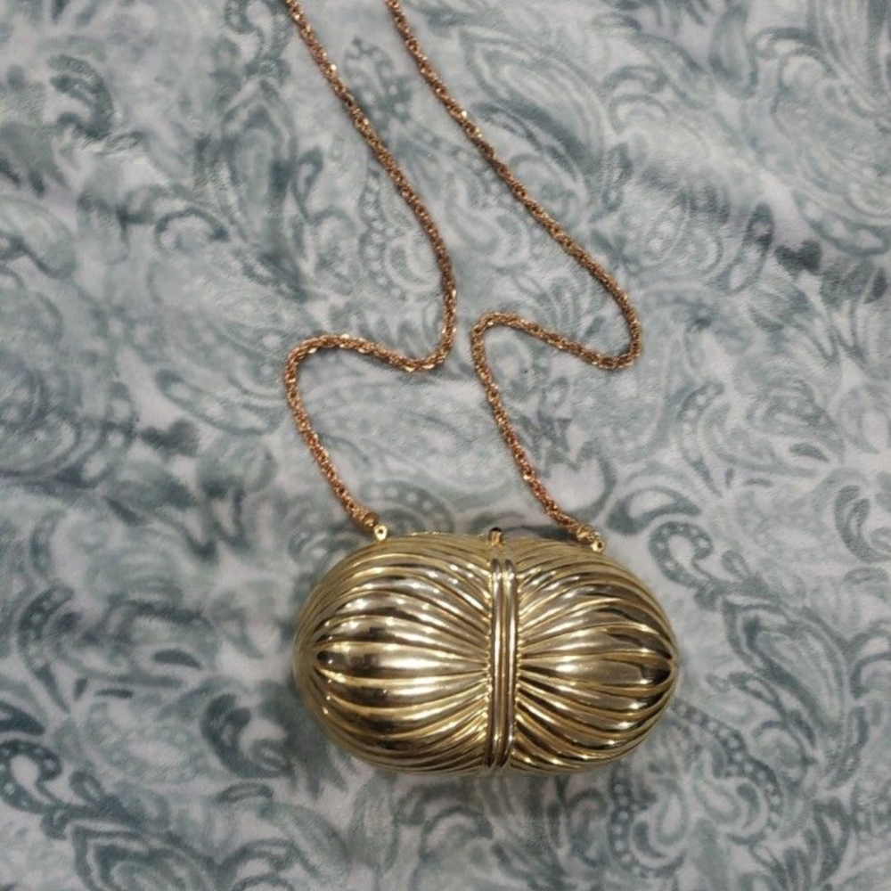 Vintage Gold Clutch Wristlet with Elegant Design